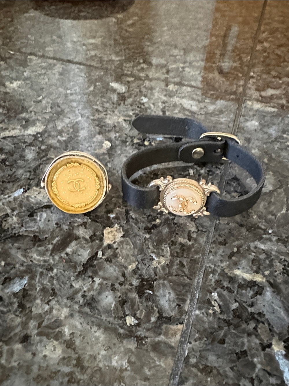 CHANEL Upcycle Black Leather Bracelet with Gold Medallion Accent